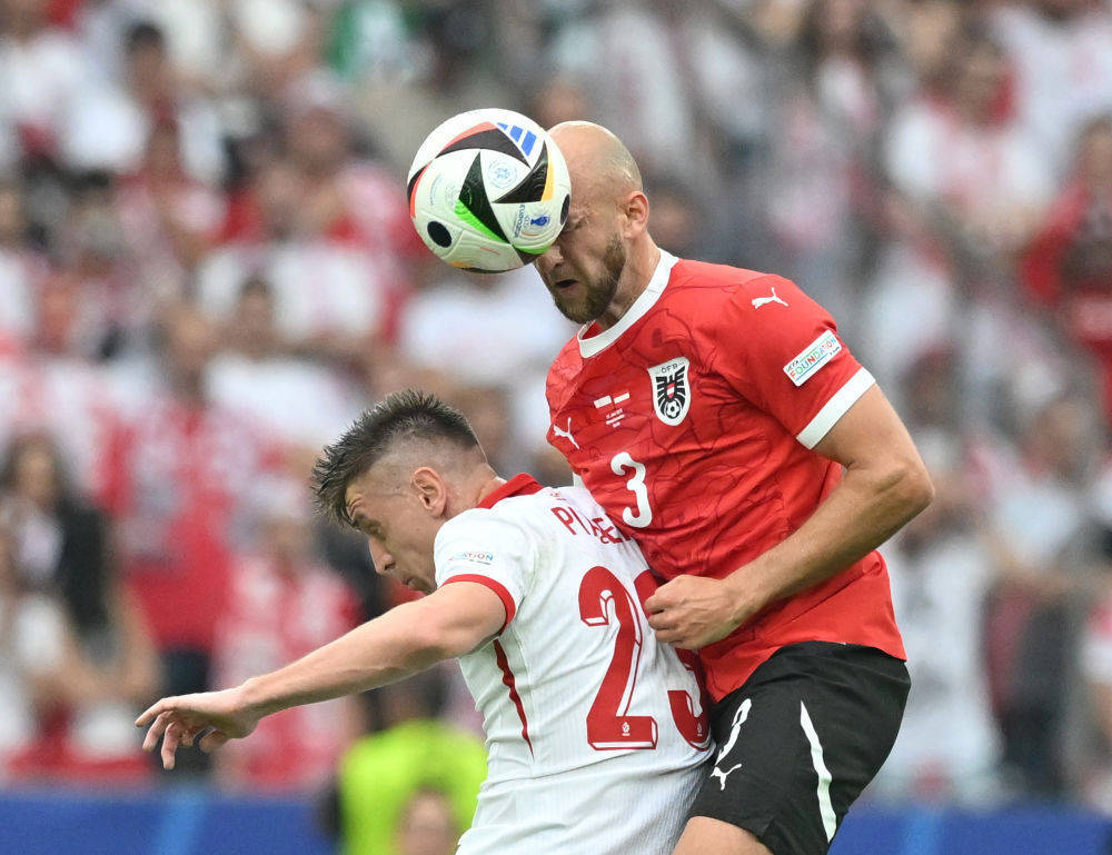 奥地利队在紧要时刻取胜，锁定欧锦赛资格